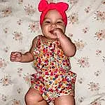 Face, Skin, Arm, Leg, White, Smile, Baby & Toddler Clothing, Sleeve, Textile, Purple, Dress, Happy, Pink, Thigh, Finger, Toddler, Flash Photography, Red, Magenta, Person, Headwear