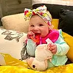 Face, Head, Smile, Facial Expression, Comfort, Yellow, Happy, Baby & Toddler Clothing, Baby, Toddler, Child, Fun, Sitting, Linens, Stuffed Toy, Baby Products, Room, Play, Plush, Person, Headwear
