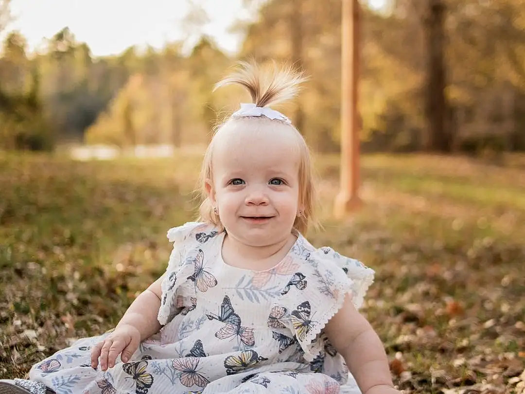Smile, Plant, People In Nature, Sky, Flash Photography, Tree, Happy, Wood, Sunlight, Grass, Baby, Toddler, Baby & Toddler Clothing, Fun, Blond, Sitting, Child, Landscape, Forest, Soil, Person, Joy
