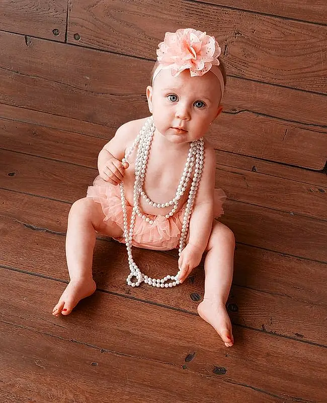 Hair, Head, Arm, Eyes, Leg, Baby & Toddler Clothing, Human Body, Flash Photography, Neck, Sleeve, Wood, Happy, Necklace, Toddler, Jewellery, Headpiece, Trunk, Hardwood, Person, Headwear