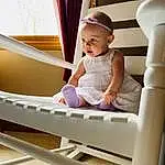 Hand, Arm, Smile, Stairs, Comfort, Baby & Toddler Clothing, Wood, Window, Toddler, Happy, Baby, Child, Room, Sitting, Hardwood, Handrail, T-shirt, Leisure, Curtain, Elbow, Person