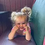 Hair, Smile, Skin, Head, Eyes, Facial Expression, Purple, Flash Photography, Happy, Pink, Toddler, Baby & Toddler Clothing, Fun, Child, Leisure, Crawling, Grass, Person, Joy