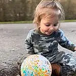 Face, Photograph, People In Nature, Happy, Grass, Fun, Leisure, Toddler, Tree, Easter, Child, Recreation, T-shirt, Pattern, Ball, Easter Egg, Soil, Play, Person