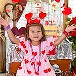 Facial Expression, Smile, Happy, Pink, Red, Toddler, Fun, People, Child, Baby & Toddler Clothing, Party Supply, Event, Entertainment, Performing Arts, Leisure, Tradition, Holiday, Costume, Party, Magenta, Person, Joy