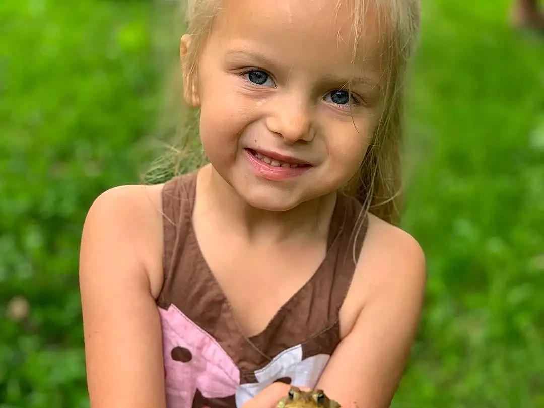 Skin, Smile, People In Nature, Green, Leaf, Dress, Nature, Plant, Botany, Happy, Pink, Pollinator, Grass, Fawn, Summer, Toddler, Meadow, Insect, Fruit, Child, Person, Joy