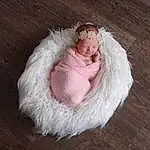 Fur Clothing, Wood, Art, Natural Material, Bridal Accessory, Embellishment, Baby, Baby & Toddler Clothing, Furry friends, Peach, Hair Accessory, Fashion Accessory, Hardwood, Headpiece, Wool, Sitting, Child, Costume Accessory, Fashion Design, Person, Headwear