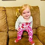Clothing, Cheek, Skin, Smile, Facial Expression, Leg, Comfort, Sleeve, Picture Frame, Baby & Toddler Clothing, Couch, Finger, Happy, Toddler, Beauty, Thigh, Rectangle, Blond, Brown Hair, Person, Joy