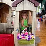 Flower, Purple, Toy, Plant, Pink, Wood, Smile, House, Cabinetry, Beauty, Room, Hardwood, Building, Magenta, Machine, Toddler, Child, Person, Joy, Headwear