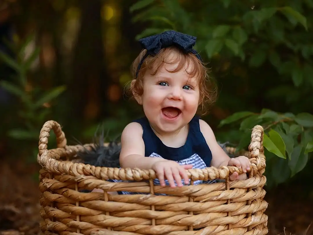 Smile, People In Nature, Plant, Happy, Wood, Toddler, Baby & Toddler Clothing, Grass, Basket, Storage Basket, Baby, Fun, Wicker, Hat, Sitting, Child, Picnic Basket, Laugh, Leisure, Person