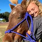 Hair, Face, Head, Smile, Sky, Horse, Eyes, Working Animal, Horse Tack, Horse Supplies, Gesture, Bridle, Happy, Fawn, Liver, Rein, Landscape, Mane, Pack Animal, Person, Joy