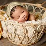 Comfort, Baby, Baby & Toddler Clothing, Wood, Flash Photography, Storage Basket, Basket, Happy, Toddler, Baby Sleeping, Infant Bed, Plant, Picnic Basket, Baby Products, Sitting, Wicker, Child, Fashion Accessory, Event, Person
