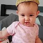 Face, Cheek, Skin, Head, Lip, Chin, Hairstyle, Facial Expression, Cap, Smile, Baby & Toddler Clothing, Neck, Sleeve, Pink, Thigh, Toddler, Baby, Happy, Person