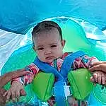 Green, Blue, People In Nature, Happy, Tent, Baby & Toddler Clothing, Leisure, Grass, Recreation, Fun, Toddler, Personal Protective Equipment, Baby, Child, Games, Inflatable, Sitting, Play, Tourism, Baby Products, Person