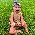 Face, Smile, Plant, People In Nature, Leaf, Baby & Toddler Clothing, Happy, Hat, Sunlight, Grass, Baby, Grassland, Summer, Meadow, Toddler, Groundcover, Shorts, Lawn, Child, Person, Joy, Headwear