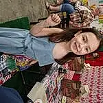 Clothing, Smile, Joint, Textile, Thigh, Happy, Cool, Leisure, People, Fun, Pattern, Human Leg, Recreation, Wrist, Event, Sitting, Knee, Plaid, Lap, Person, Joy