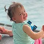 Nose, Skin, Smile, Hand, Water, Arm, Azure, Sleeve, Happy, Baby & Toddler Clothing, Gesture, Leisure, Thumb, Travel, Toddler, Baby, Fun, Summer, Child, Elbow, Person