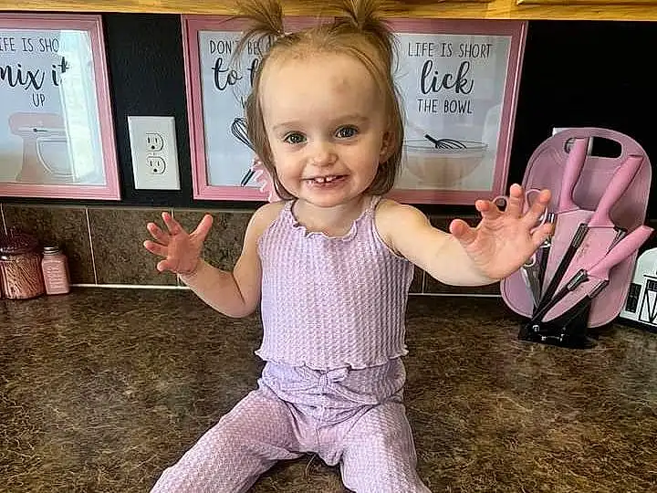Smile, Facial Expression, Wood, Sleeve, Standing, Baby & Toddler Clothing, Happy, Gesture, Pink, Finger, T-shirt, Toddler, Fun, Thumb, Picture Frame, Thigh, Hardwood, Waist, Person, Joy