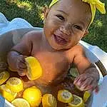 Smile, Facial Expression, Rangpur, Fruit, Yellow, Plant, Happy, Chest, Toddler, Citrus, Leisure, Natural Foods, Trunk, Banana, Child, Abdomen, Meyer Lemon, Baby, Fun, Orange, Person, Joy