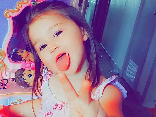 Skin, Mouth, Purple, Happy, Flash Photography, Pink, Finger, Toddler, Cool, Eyelash, Black Hair, Magenta, Fun, Long Hair, Beauty, Child, Sweetness, Baby, Room, Play, Person