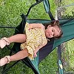 Leg, People In Nature, Grass, Thigh, Leisure, Recreation, Fun, Swing, Human Leg, Toddler, Sandal, Sitting, Tree, Plant, Outdoor Furniture, Baby & Toddler Clothing, Smile, Foot, Happy, Knee, Person