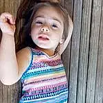 Face, Hair, Joint, Skin, Outerwear, Shoulder, Neck, Azure, Baby & Toddler Clothing, Sleeve, Waist, Wood, T-shirt, Iris, Pink, Happy, Cool, Trunk, Toddler, Long Hair, Person