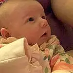 Nose, Face, Cheek, Skin, Head, Chin, Facial Expression, Comfort, Mouth, Baby, Finger, Pink, Toddler, Baby & Toddler Clothing, Thumb, Child, Close-up, Happy, Linens, Person