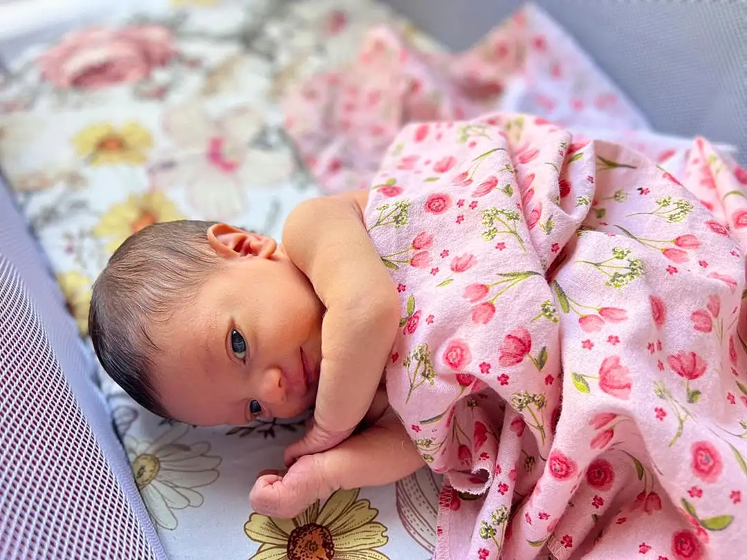 Face, Skin, Head, White, Baby & Toddler Clothing, Human Body, Textile, Sleeve, Baby, Comfort, Pink, Toddler, Red, Happy, Linens, Insect, Pattern, Pollinator, Arthropod, Butterfly, Person