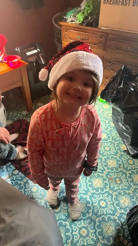 Smile, Toddler, Headgear, Happy, Fun, Baby, Baby & Toddler Clothing, Child, Holiday, Event, Room, Tree, Christmas, Christmas Eve, Winter, Sitting, Living Room, Lap, Luggage And Bags, Person, Joy, Headwear