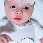 Face, Cheek, Skin, Lip, Eyes, White, Flower, Blue, Baby & Toddler Clothing, Textile, Sleeve, Pink, Petal, Iris, Baby, Happy, Child, Headgear, Toddler