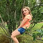Plant, People In Nature, Branch, Thigh, Grass, Tree, Elbow, Happy, Knee, Trunk, Human Leg, Wood, Blond, Fun, Leisure, Shorts, Boot, Waist, Sandal, Foot, Person, Joy