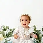 Head, Flower, Plant, Flash Photography, Smile, Happy, Petal, Baby & Toddler Clothing, Headgear, Baby, Headpiece, Toddler, Flower Arranging, Headband, Hair Accessory, Embellishment, Bouquet, Cut Flowers, Event, Child, Person, Joy