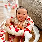 Face, Smile, Skin, Head, White, Comfort, Baby & Toddler Clothing, Happy, Baby, Thigh, Toddler, Fun, Couch, Leisure, Human Leg, Event, Child, Chair, Sitting, Sandal, Person, Joy