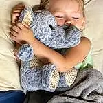 Joint, Skin, Hand, Comfort, Textile, Gesture, Happy, Finger, Fawn, Toddler, Baby & Toddler Clothing, Toy, Baby, Stuffed Toy, Child, Hug, Sitting, Wool, Furry friends, Linens