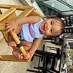 Smile, Shorts, Wood, Toddler, Outdoor Furniture, T-shirt, Child, Leisure, Fun, Wood Stain, Baby & Toddler Clothing, Hardwood, Vroom Vroom, Lumber, Machine, Happy, Vacation, Automotive Exterior, Tire, Room, Person, Joy