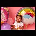 Smile, Flash Photography, Lighting, Happy, Pink, Material Property, Toddler, Magenta, Balloon, Beauty, Event, Art, Fun, Circle, Child, Party Supply, Baby, Baby & Toddler Clothing, Peach, Recreation, Person, Joy