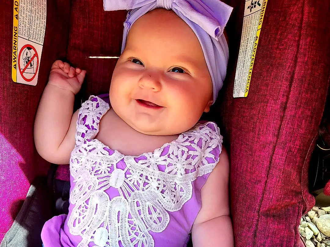 Face, Cheek, Skin, Smile, Eyes, Purple, Mouth, Baby & Toddler Clothing, Human Body, Fashion, Textile, Sleeve, Violet, Happy, Pink, Iris, Baby, Cool, Toddler, Person, Headwear
