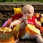 Toy, Plant, Orange, Yellow, Happy, Grass, Fawn, Baby & Toddler Clothing, Leisure, Fun, Toddler, Teddy Bear, People, Baby, Stuffed Toy, Recreation, People In Nature, Person