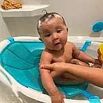 Baby Bathing, Water, Blue, Fluid, Liquid, Bathing, Fun, Toddler, Leisure, Baby, Balloon, Recreation, Personal Care, Happy, Plumbing, Bathroom, Child, Chest, Thigh, Plastic, Person