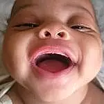 Nose, Cheek, Skin, Lip, Chin, Tongue, Eyebrow, Mouth, Smile, Jaw, Tooth, Iris, Happy, Eyelash, Baby, Toddler, Fun, Child, Close-up, Event, Person