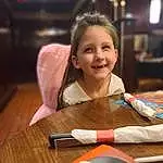 Smile, Table, Toddler, Chair, Wood, Happy, Desk, Tableware, Plate, Fun, Child, Event, Recreation, Sitting, T-shirt, Junk Food, Comfort Food, Baby, Room, Icing, Person, Joy