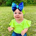 Clothing, Face, Jeans, Photograph, Plant, Blue, Green, Cap, Smile, People In Nature, Baby & Toddler Clothing, Happy, Costume Hat, Headgear, Grass, Fun, Tree, Toddler, Electric Blue, Child, Person, Joy, Headwear