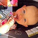 Nose, Cheek, Skin, Lip, Mouth, Eyelash, Orange, Iris, Tableware, Nail, Finger, Drinkware, Baby & Toddler Clothing, Toddler, Baby, Happy, Child, Wrist, Fashion Accessory, Baby Products, Person