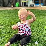 Smile, Green, People In Nature, Plant, Leaf, Baby & Toddler Clothing, Happy, Sleeve, Grass, Baby, Toddler, Leisure, T-shirt, Groundcover, Recreation, Lawn, Grassland, Fun, Child, Person