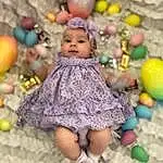 Outerwear, Photograph, Smile, Facial Expression, Green, Purple, Textile, Happy, Yellow, Dress, Doll, Pink, Toy, Fun, Adaptation, People, Child, Party Supply, Art, Beauty, Person, Headwear