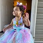 Smile, Purple, Dress, Happy, Ballerina tutu, Baby & Toddler Clothing, Pink, Entertainment, Flash Photography, Performing Arts, Fashion Design, Magenta, Toddler, Event, Ruffle, Headpiece, Costume, Fun, Child, Fashion Accessory, Person