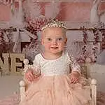 Clothing, Smile, White, Dress, Baby & Toddler Clothing, Textile, Flash Photography, Happy, Embellishment, Pink, Baby, Wedding Ceremony Supply, Bridal Party Dress, Headpiece, Gown, Bridal Clothing, Toddler, Bridal Accessory, Formal Wear, Ruffle, Person, Joy
