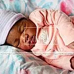 Child, Baby, Skin, Pink, Cheek, Birth, Sleep, Baby Sleeping, Bedtime, Nap, Childbirth, Toddler, Comfort, Blanket, Textile, Hand, Linens, Bedding, Smile, Person, Headwear