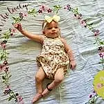 Skin, Plant, Hand, White, Flower, Botany, Petal, Leaf, Dress, Textile, Happy, Baby & Toddler Clothing, Pink, Baby, Grass, Toddler, Summer, Pattern, Beauty, Person