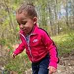 Face, Plant, Smile, People In Nature, Tree, Sleeve, Happy, Toddler, Grass, Baby & Toddler Clothing, Leisure, Wood, T-shirt, Landscape, Recreation, Soil, Walking, Magenta, Fun, Forest, Person