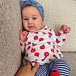 Face, Arm, Facial Expression, Comfort, Baby & Toddler Clothing, Textile, Sleeve, Baby, Toddler, Linens, Pattern, Child, Baby Products, Carmine, Sitting, Room, Baby Sleeping, Wood, Person, Headwear